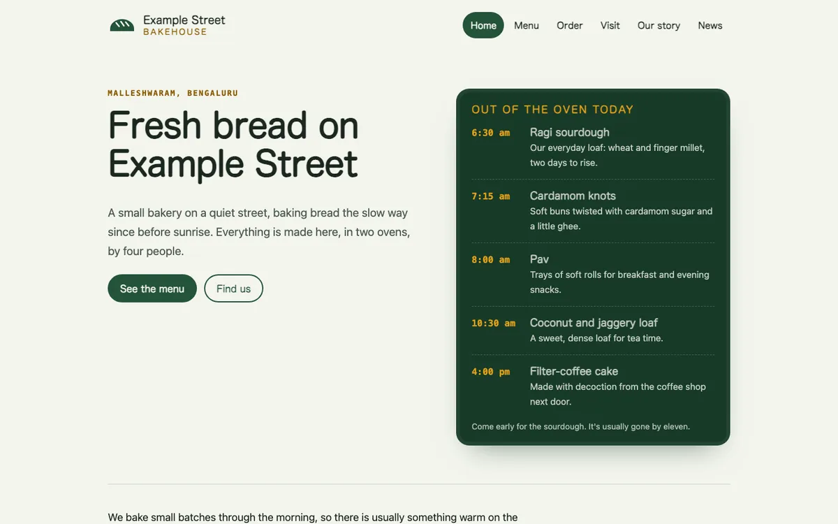 La page d'accueil de l'exemple de boulangerie : le titre « Fresh bread on Example Street » à côté d'un tableau qui liste ce qui sort du four chaque jour.